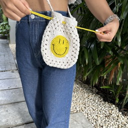 Smiley Drawstring Crossbody Bag