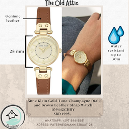 Anne Klein gold tone champagne dial and brown leather strap watch