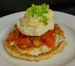 Moroccan Harcha with Poached Eggs, Spicy Tomato Sauce and Cream Cheese Spread