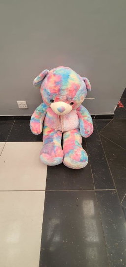 Cuddly Plush Teddy Bear with pink Ribbon