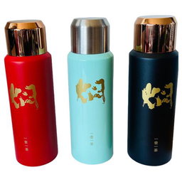 Thermos Flask with a Shiny Gold Cap and an Artistic, Gold-Colored Design