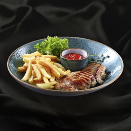 Grilled chicken breast with fries