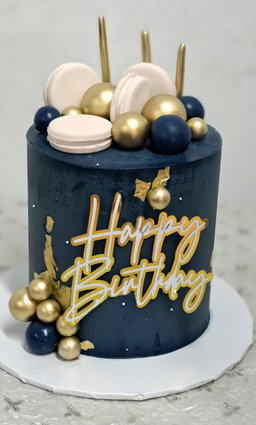 6inches 3 layers blue body decorated with fondant macaroons, balls and hbd topper 
