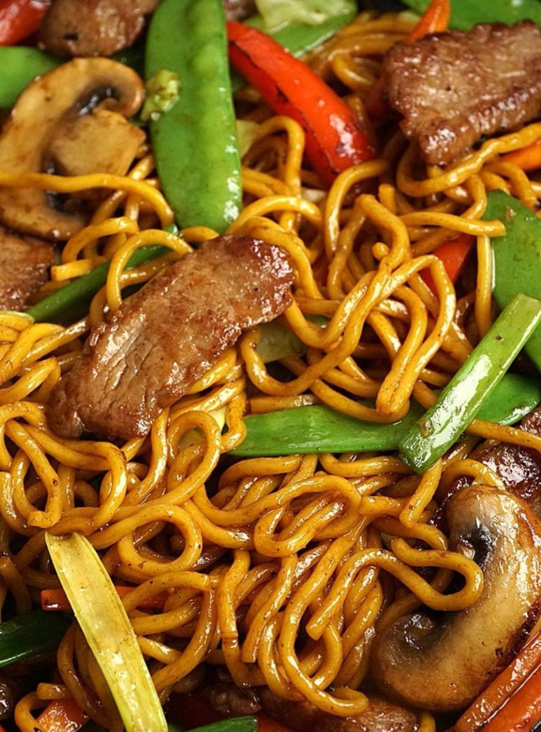 Stirfry beef n mushroom n garden vegetables spaghetti W teriyaki sauce