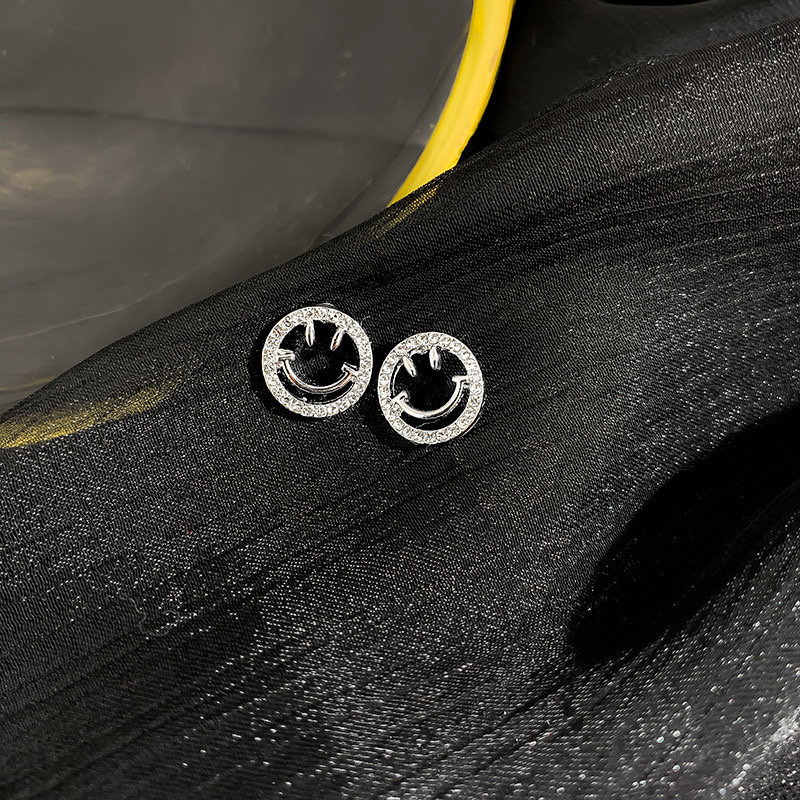Smiley face stud earrings