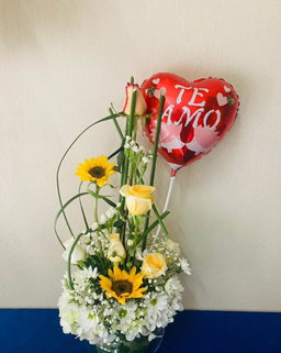 Arreglo en girasoles y rosas 