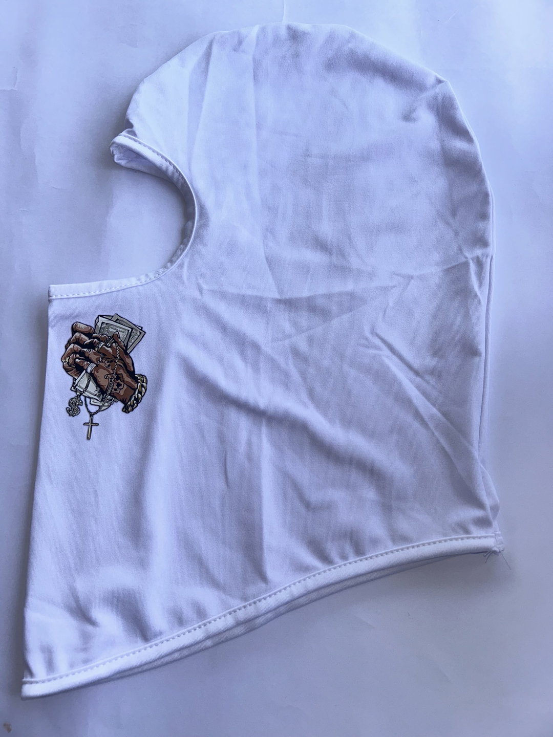 White mask with money sign