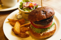Burgeristic with fries and salad