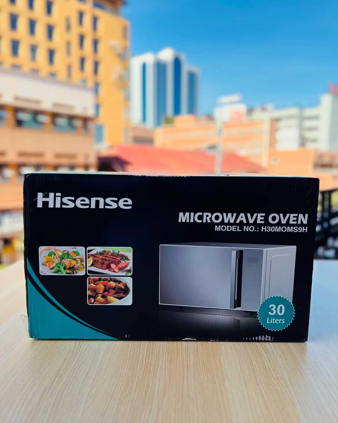 Hisense 30-litre Microwave H30MOMMI; 900-watts power, 6 auto programs, 10 power settings_0