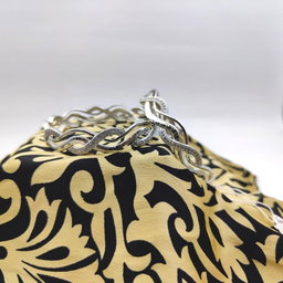 Silver leucrocotta bangles for women