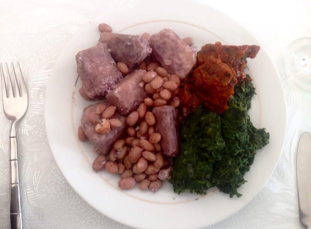 Local food Beans with yams and fried meat 