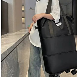 MULTI-FUNCTIONAL EXPANDABLE TRAVEL BAG WITH REMOVABLE WHEELS 