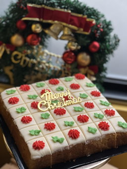 Sliced Orange Butter Cake with Butter Icing