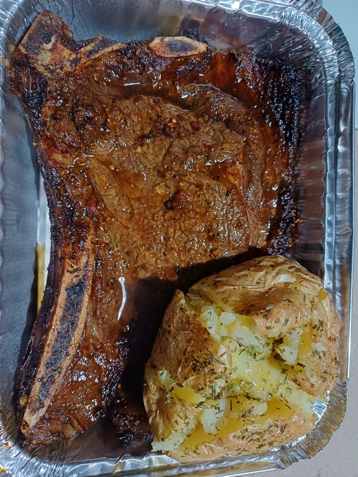 T-Bone steak + baked potato _0