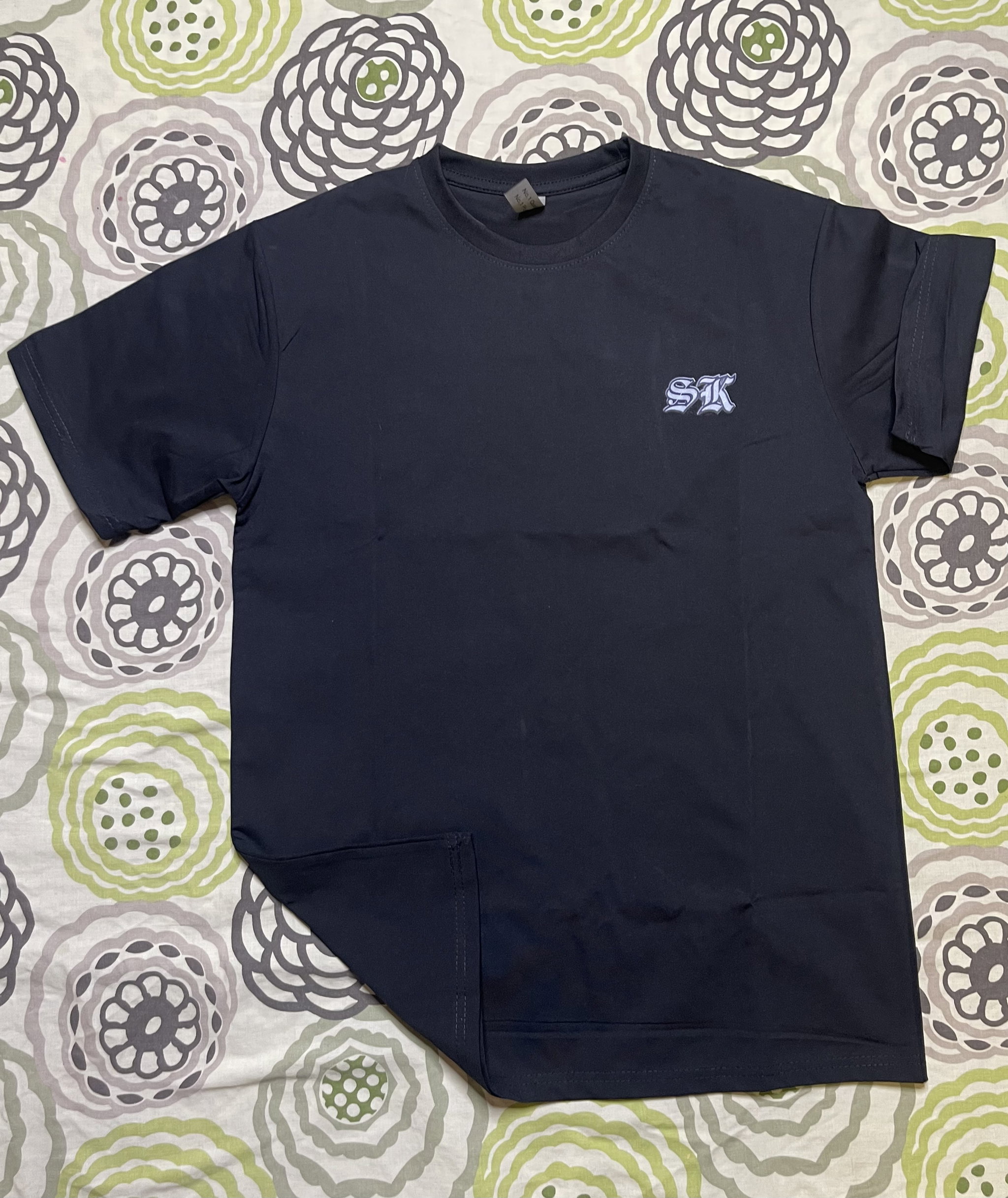 Black street wear T-shirt featuring a sleek design _1