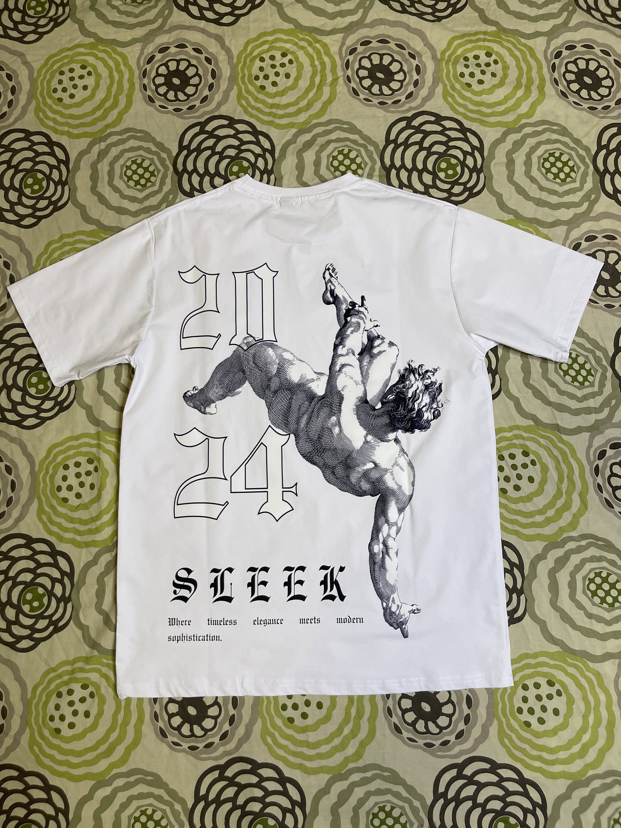 A white street wear T-shirt featuring a sleek design _2