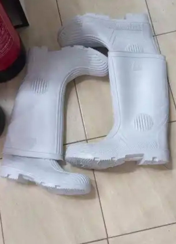 White theatre gumboots