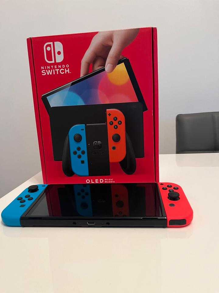 Nintendo Switch Oled Édition Rouge et Bleu (Occasion)