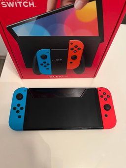 Nintendo Switch Oled Édition Rouge et Bleu (Occasion)