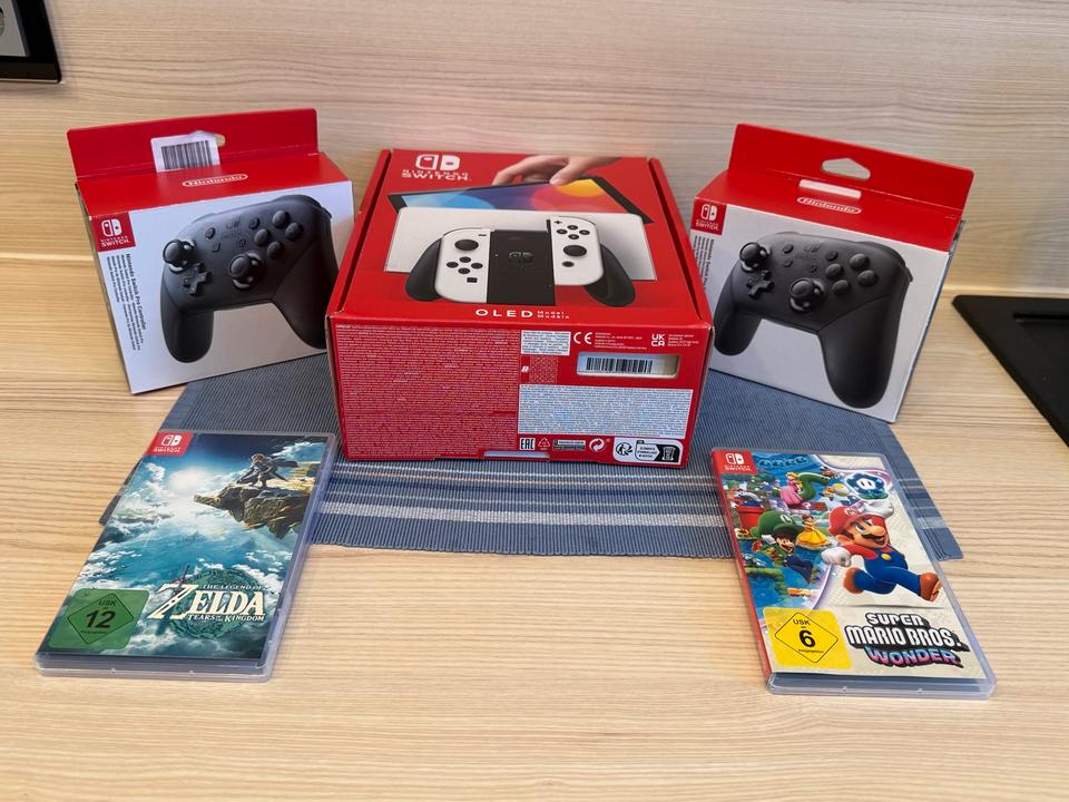 Nintendo Switch OLED, 2 jeux, 2 manettes EN ABSOLUMENT ÉTAT NEUF !_0