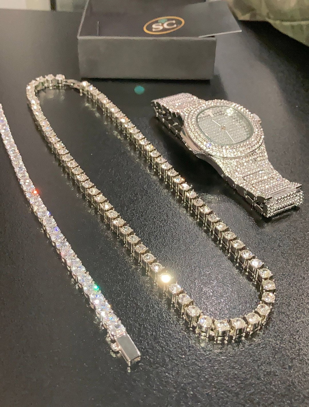 Iced out jewelry set of three. 