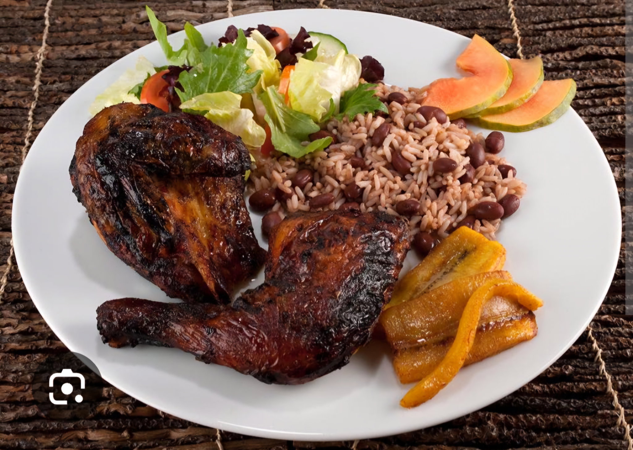 Jerk Chicken & Jerk Pork Served with Rice and Peas, Toss Salad, Peppered Corn on the Cob & Water_0