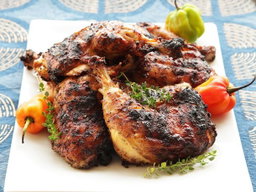 Barbe Fry Chicken with Jerk Chicken Served with Rice & Peas, Peppered Corn on the Cob and Toss Salad 