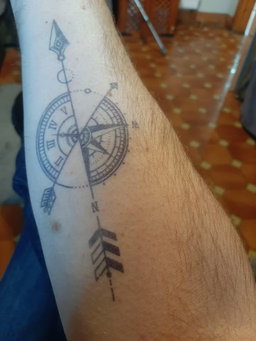 Brujula y flecha