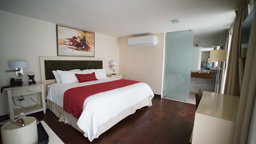Habitacion Sencilla/1 persona/1 cama, Impuestos incluidos y desayuno cortesía. 