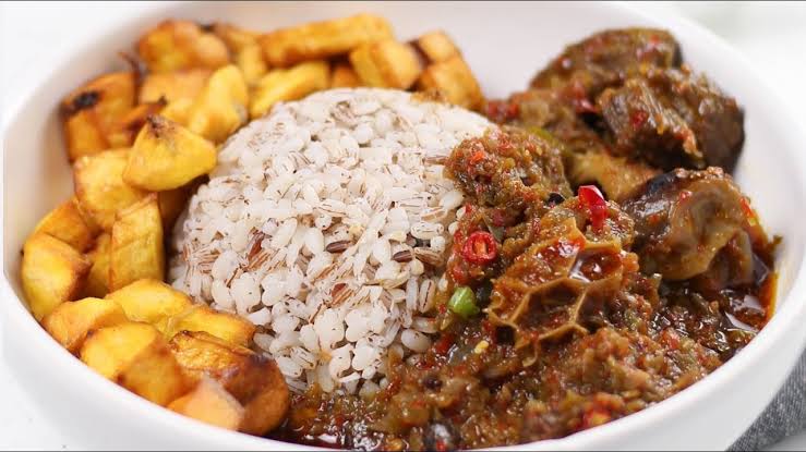 Ofada rice and sauce (including free drink )_0