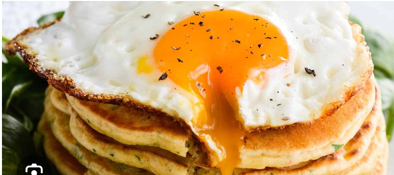 Pancakes with Sunny Eggs, Hash Brown, Chicken Sausage & Tomato