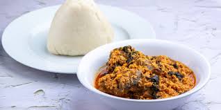 Egusi Soup with Kpomo & Fish