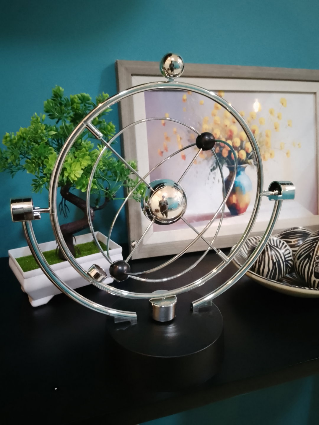Perpetual rotating pendulum
