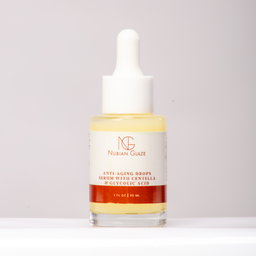 Anti-Aging Drops Serum with Centella & Glycolic Acid ( Combats inflammation, boosts collagen, fades spots. Centella, glycolic acid, Vitamin E).