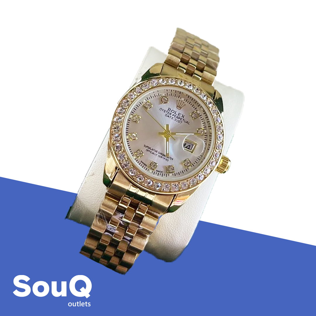 Women's Rolex with Gold Case and White Dial _0