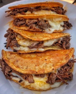 La Birria Moo Tacos