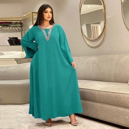 Women's dress with beads and diamonds
