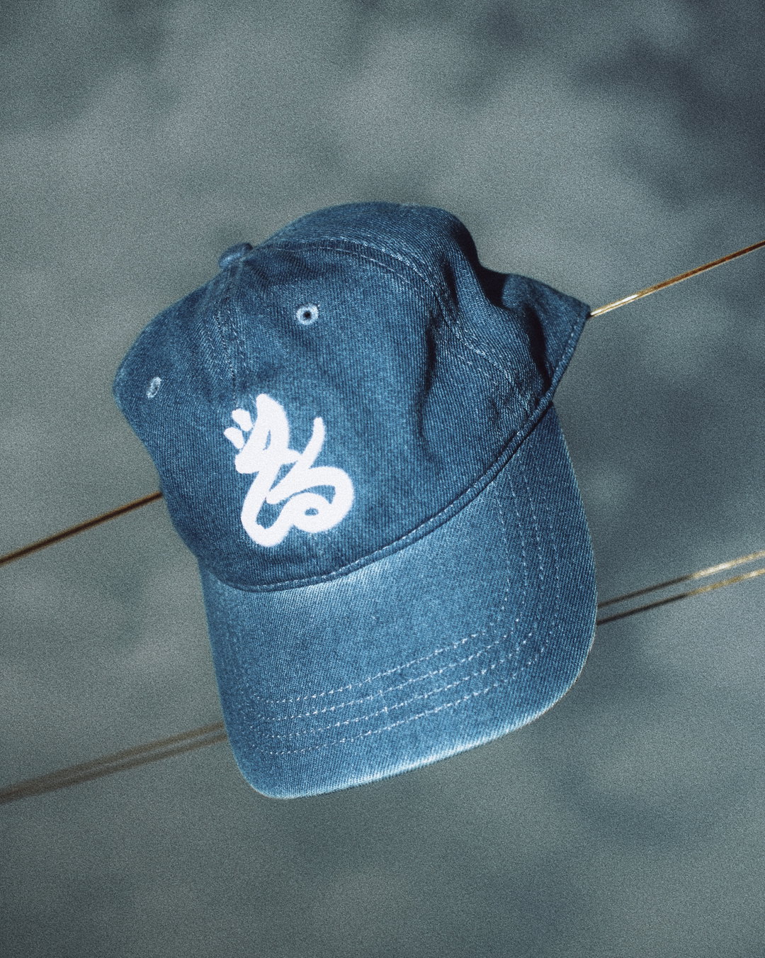 Washed Denim كُمّة logo dad hat (Light Blue Denim)