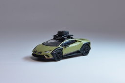 SPARKY MODEL 1/64 LAMBORGHINI HURACÁN STERRATO WITH A ROOF RACK AND A WHEEL - GREEN