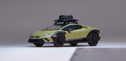 SPARKY MODEL 1/64 LAMBORGHINI HURACÁN STERRATO WITH A ROOF RACK AND A WHEEL - GREEN