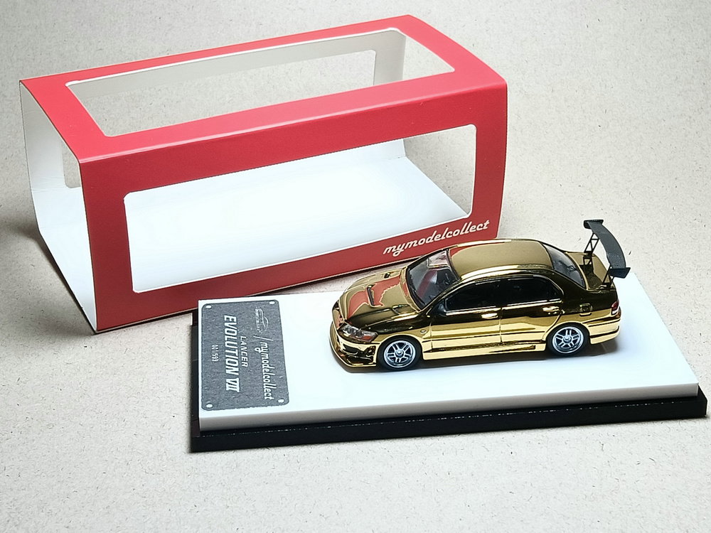 MODELCOLLECT 1/64 MITSUBISHI EVO 7 - GOLD CHROME_0