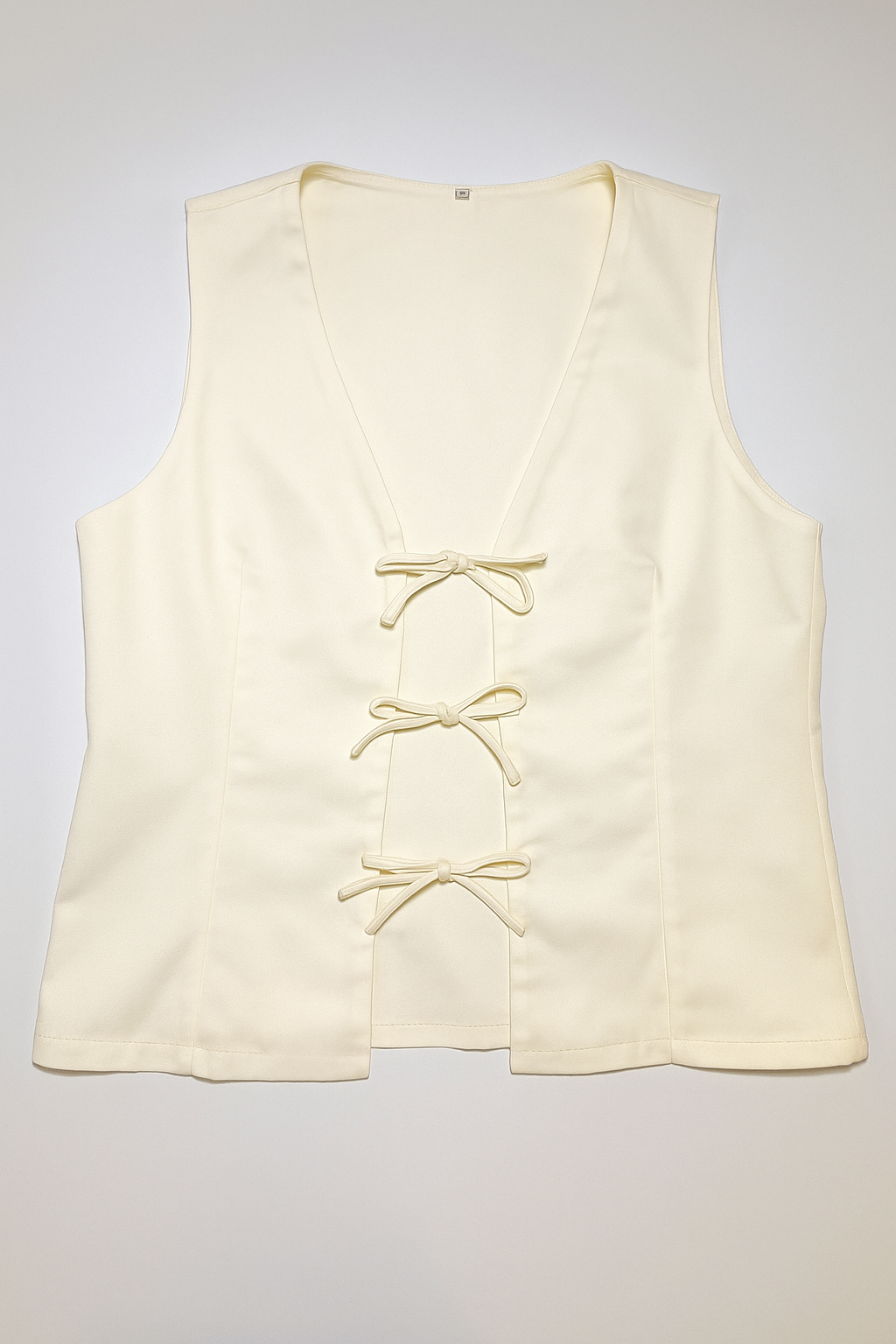 Chaleco beige sin mangas con lazos frontales - Size S