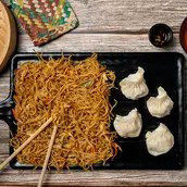 4 Pcs Steamed  Chicken Momo With Half Chicken Noodles