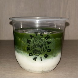 Geisha blossom tea cold foam matcha latte 