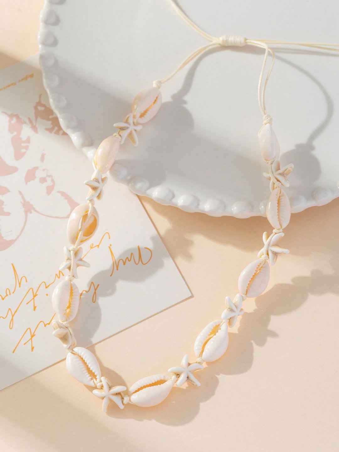 Collar de conchas y estrellas