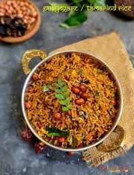 Home Puliyogare Rice