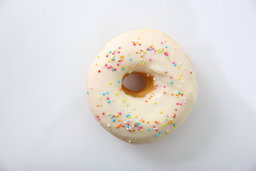 DONA GLASEADA CON CHOCOLATE BLANCO