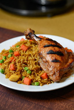 Jollof / Fried Rice with Grilled or Fried chicken 