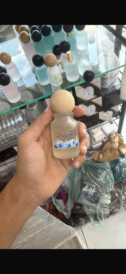 توزيعات عطور مع طباعه يوفي حسب الطلب عدد12