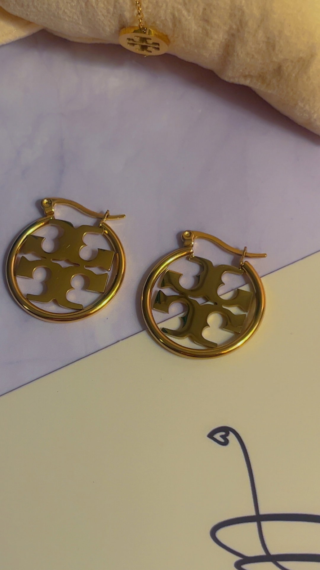 TB Earrings